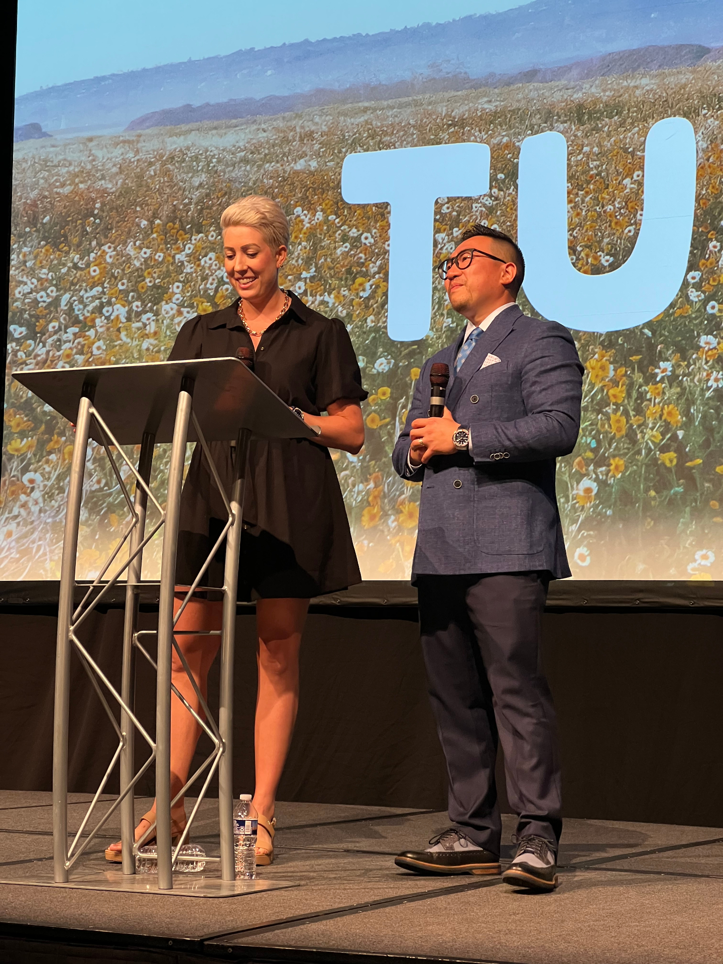 Jack and April Tu speaking together on stage